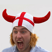 England flag headgear worn by football fan.